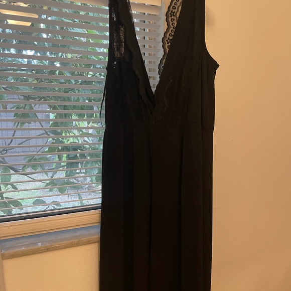 Never worn romper. - Picture 2 of 3